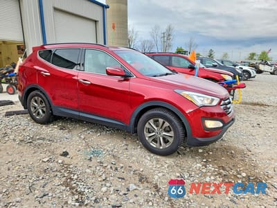 Czwarte zdjęcie samochodu z boku: 2014 HYUNDAI SANTA FE SPORT 2.4L VIN:5XYZU3LB4EG131265 - miniatura