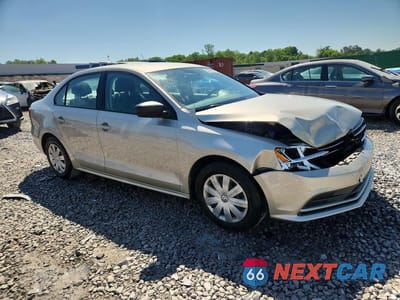 Czwarte zdjęcie samochodu z boku: 2015 VOLKSWAGEN JETTA BASE VIN:3VW2K7AJ8FM260295 - miniatura