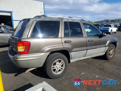 Trzecie zdjęcie samochodu z tyłu: 2000 JEEP GRAND CHEROKEE LAREDO VIN:1J4G248S2YC227054 - miniatura