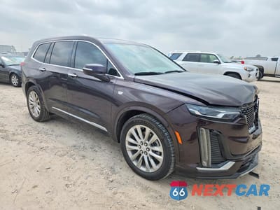 Czwarte zdjęcie samochodu z boku: 2021 CADILLAC XT6 PREMIUM LUXURY VIN:1GYKPCRSXMZ190802 - miniatura