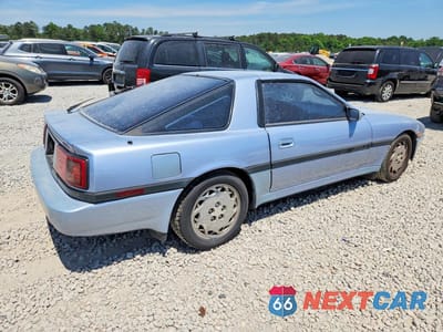 Trzecie zdjęcie samochodu z tyłu: 1987 TOYOTA SUPRA SPORT ROOF VIN:JT2MA70J0H0063958 - miniatura