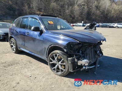 Czwarte zdjęcie samochodu z boku: 2020 BMW X5 M50I VIN:5UXJU4C09L9C18290 - miniatura
