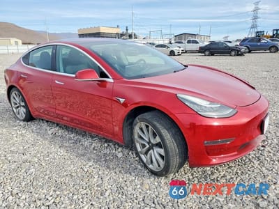 Czwarte zdjęcie samochodu z boku: 2018 TESLA MODEL 3 VIN:5YJ3E1EA5JF024416 - miniatura