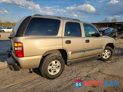 Trzecie zdjęcie samochodu z tyłu: 2003 CHEVROLET TAHOE C1500 VIN:1GNEC13ZX3R135877 - miniatura