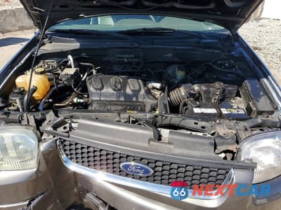 Zdjęcie 12 z 13 samochodu: 2003 FORD ESCAPE XLT VIN:1FMYU93113KE02680 - miniatura