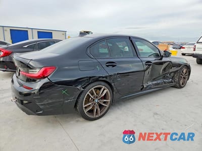 Trzecie zdjęcie samochodu z tyłu: 2021 BMW M340I VIN:3MW5U7J04M8C09266 - miniatura
