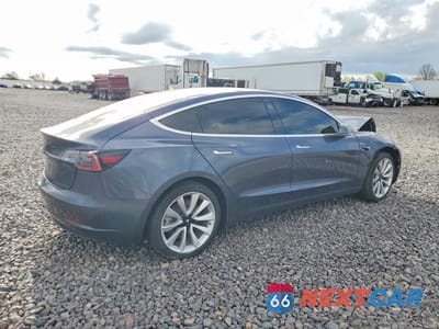 Trzecie zdjęcie samochodu z tyłu: 2018 TESLA MODEL 3 VIN:5YJ3E1EAXJF023925 - miniatura