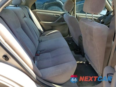 Zdjęcie 10 z 12 samochodu: 1999 TOYOTA CAMRY LE VIN:4T1BG22K5XU453124 - miniatura