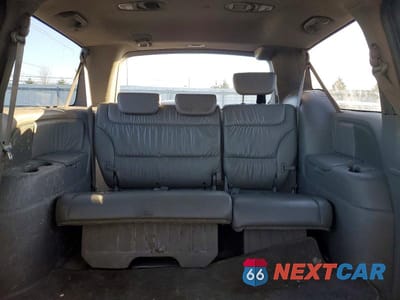 Zdjęcie 10 z 13 samochodu: 2010 HONDA ODYSSEY EXL VIN:5FNRL3H73AB100629 - miniatura