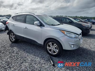 Czwarte zdjęcie samochodu z boku: 2013 HYUNDAI TUCSON GLS VIN:KM8JU3AC9DU637708 - miniatura