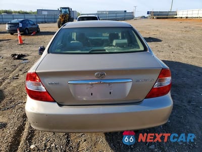 Zdjęcie 6 z 11 samochodu: 2002 TOYOTA CAMRY LE VIN:4T1BE32K92U016070 - miniatura