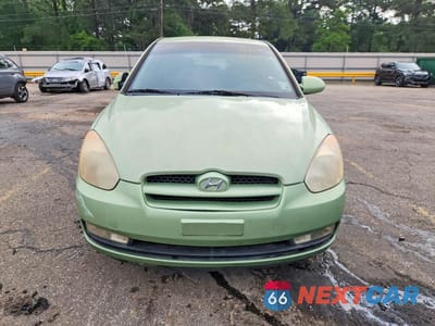 Piąte zdjęcie samochodu w środku: 2007 HYUNDAI ACCENT SE VIN:KMHCN36C37U008559 - miniatura