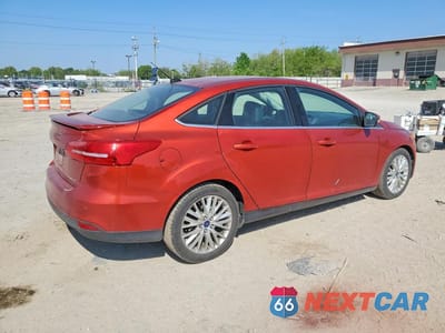 Trzecie zdjęcie samochodu z tyłu: 2018 FORD FOCUS TITANIUM VIN:1FADP3J2XJL277064 - miniatura