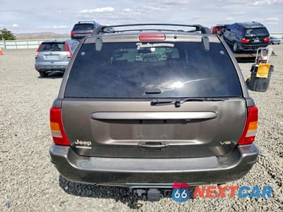 Zdjęcie 6 z 13 samochodu: 1999 JEEP GRAND CHEROKEE LIMITED VIN:1J4GW68N2XC677361 - miniatura