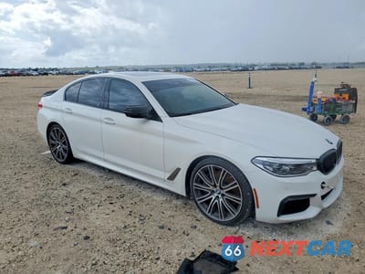 Czwarte zdjęcie samochodu z boku: 2020 BMW M550XI VIN:WBAJS7C04LCD22307 - miniatura
