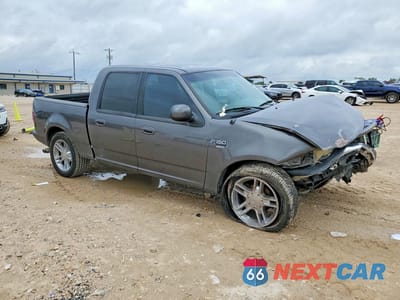 Czwarte zdjęcie samochodu z boku: 2002 FORD F150 SUPERCREW VIN:1FTRW07L82KA89300 - miniatura