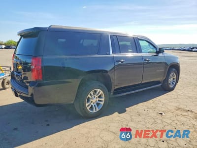 Trzecie zdjęcie samochodu z tyłu: 2019 CHEVROLET SUBURBAN K1500 LT VIN:1GNSKHKC5KR155576 - miniatura