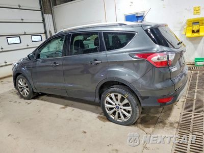 Drugie zdjęcie samochodu z przodu: 2017 FORD ESCAPE TITANIUM VIN:1FMCU0J91HUB56742 - miniatura