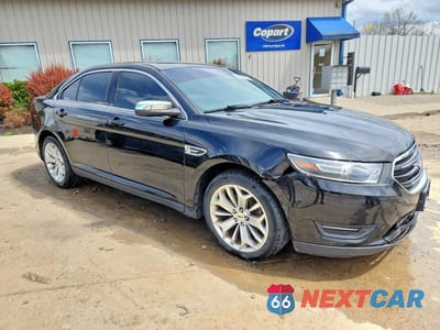 Czwarte zdjęcie samochodu z boku: 2017 FORD TAURUS LIMITED VIN:1FAHP2F81HG113150 - miniatura