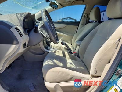 Zdjęcie 7 z 11 samochodu: 2010 TOYOTA COROLLA LE VIN:1NXBU4EE1AZ206426 - miniatura