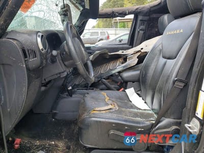 Zdjęcie 7 z 12 samochodu: 2013 JEEP WRANGLER UNLIMITED SAHARA VIN:1C4BJWEG8DL663464 - miniatura