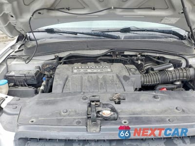 Zdjęcie 12 z 12 samochodu: 2005 HONDA PILOT LX VIN:2HKYF18105H545565 - miniatura