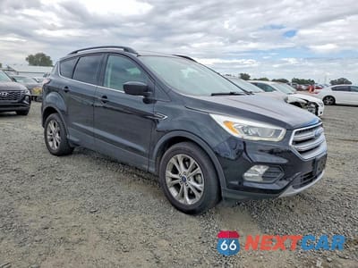 Czwarte zdjęcie samochodu z boku: 2017 FORD ESCAPE SE VIN:1FMCU0GD3HUC98442 - miniatura
