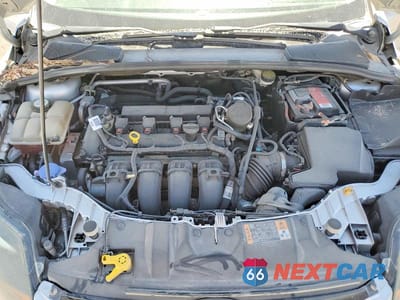 Zdjęcie 11 z 13 samochodu: 2014 FORD FOCUS TITANIUM VIN:1FADP3N26EL299837 - miniatura