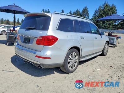 Trzecie zdjęcie samochodu z tyłu: 2016 MERCEDES-BENZ GL 450 4MATIC VIN:4JGDF6EE5GA681022 - miniatura