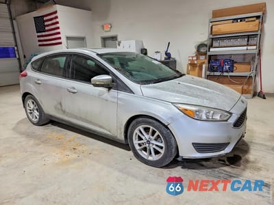 Czwarte zdjęcie samochodu z boku: 2015 FORD FOCUS VIN:1FADP3K28FL304087 - miniatura