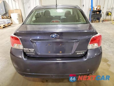 Zdjęcie 6 z 11 samochodu: 2014 SUBARU IMPREZA PREMIUM VIN:JF1GJAC63EH009713 - miniatura