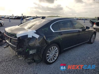 Trzecie zdjęcie samochodu z tyłu: 2022 BMW 740 I VIN:WBA7T2C00NCH54907 - miniatura