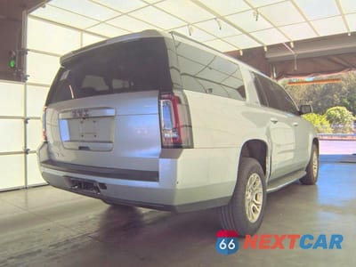 Czwarte zdjęcie samochodu z boku: 2017 GMC YUKON XL K1500 SLT VIN:1GKS2GKC2HR152893 - miniatura
