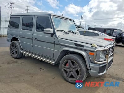 Czwarte zdjęcie samochodu z boku: 2016 MERCEDES-BENZ G 63 AMG VIN:WDCYC7DF8GX246212 - miniatura