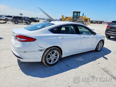 Trzecie zdjęcie samochodu z tyłu: 2018 FORD FUSION SE HYBRID VIN:3FA6P0LU9JR171938 - miniatura