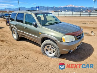 Czwarte zdjęcie samochodu z boku: 2002 MAZDA TRIBUTE LX VIN:4F2YU08142KM07136 - miniatura