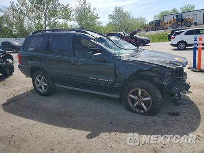 Czwarte zdjęcie samochodu z boku: 2003 JEEP GRAND CHEROKEE OVERLAND VIN:1J8GW68J33C611908 - miniatura