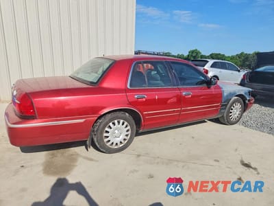 Trzecie zdjęcie samochodu z tyłu: 1999 MERCURY GRAND MARQUIS GS VIN:2MEFM74W0XX671703 - miniatura