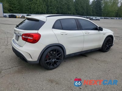 Trzecie zdjęcie samochodu z tyłu: 2015 MERCEDES-BENZ GLA 45 AMG VIN:WDDTG5CBXFJ077471 - miniatura