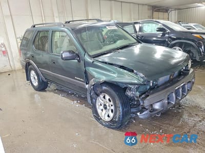 Czwarte zdjęcie samochodu z boku: 2003 ISUZU RODEO S VIN:4S2CK58W434303460 - miniatura