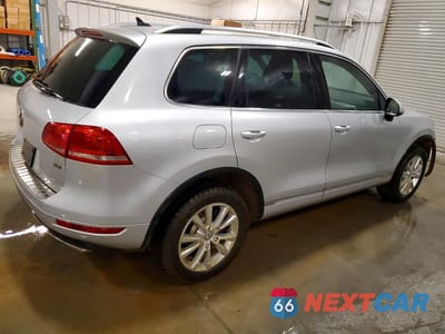 Trzecie zdjęcie samochodu z tyłu: 2013 VOLKSWAGEN TOUAREG V6 TDI VIN:WVGEP9BP3DD013285 - miniatura