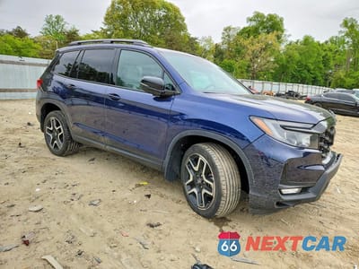 Czwarte zdjęcie samochodu z boku: 2022 HONDA PASSPORT ELITE VIN:5FNYF8H01NB032033 - miniatura