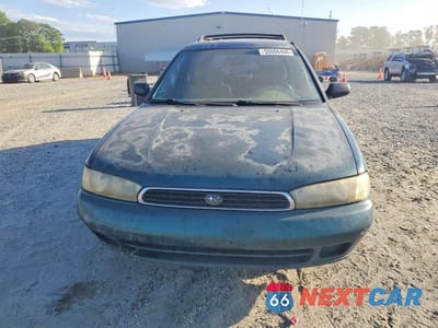 Piąte zdjęcie samochodu w środku: 1995 SUBARU LEGACY L VIN:4S3BK6352S7340760 - miniatura