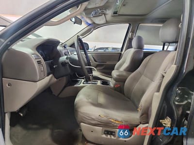 Zdjęcie 7 z 13 samochodu: 2004 JEEP GRAND CHEROKEE LAREDO VIN:1J4GX48S74C171124 - miniatura
