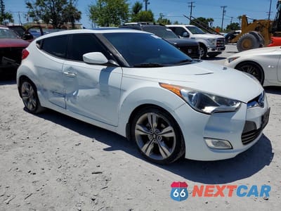 Czwarte zdjęcie samochodu z boku: 2012 HYUNDAI VELOSTER BASE VIN:KMHTC6AD0CU053766 - miniatura