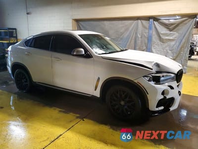 Czwarte zdjęcie samochodu z boku: 2015 BMW X6 XDRIVE50I VIN:5UXKU6C5XF0F94310 - miniatura