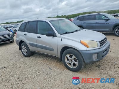 Czwarte zdjęcie samochodu z boku: 2001 TOYOTA RAV4 BASE VIN:JTEGH20V610033516 - miniatura