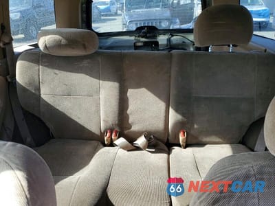 Zdjęcie 10 z 13 samochodu: 2000 JEEP GRAND CHEROKEE LAREDO VIN:1J4GW48S0YC388328 - miniatura
