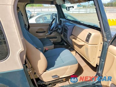 Zdjęcie 8 z 12 samochodu: 2000 JEEP WRANGLER / TJ SAHARA VIN:1J4FA59S6YP801649 - miniatura