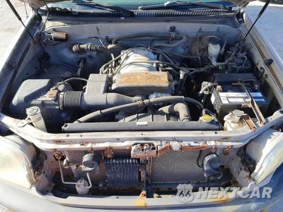 Zdjęcie 11 z 12 samochodu: 2001 TOYOTA TUNDRA SR5 VIN:5TBBT44181S199901 - miniatura